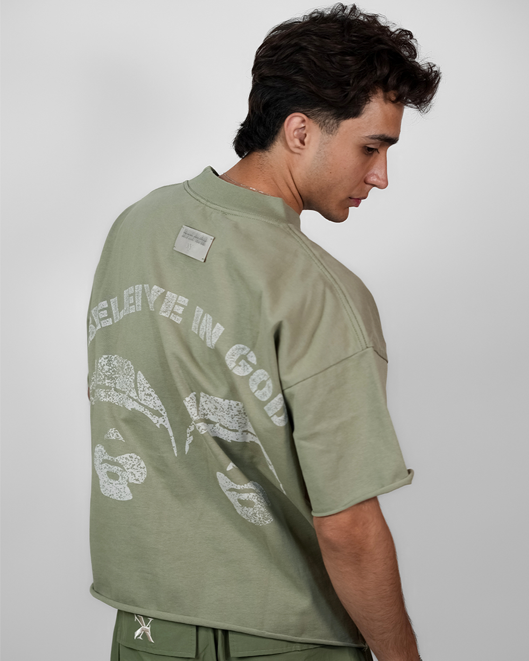 SEAMLESS BELIEVE IN GOD TEE [UNISEX] – SAGE GREEN